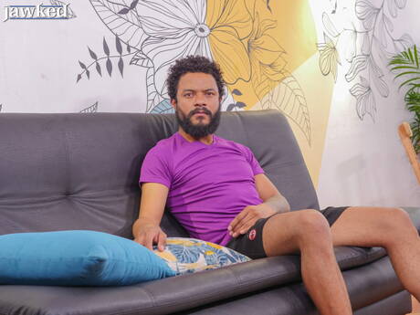 Ebony hunk Ego Red undressing and showing tight butt