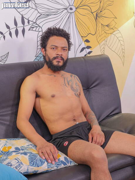 Ebony hunk Ego Red undressing and showing tight butt