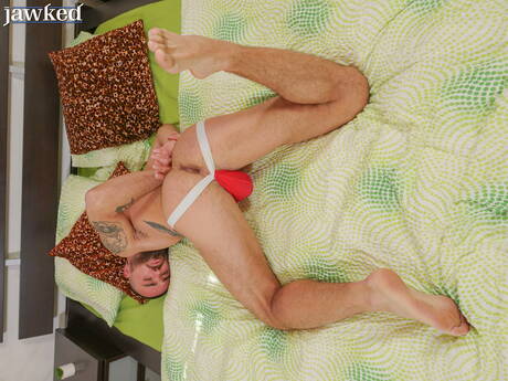 Czech strongman Daniello Danure posing naked and showing his ass