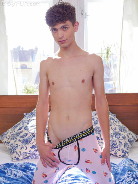 American young Zayne Bright undressing and showing his ass