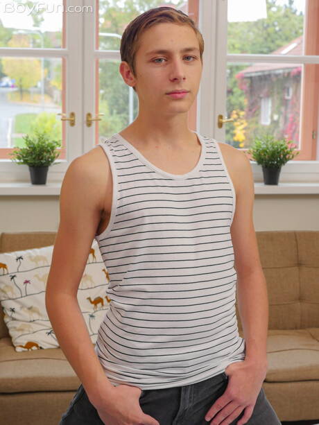 Young Timmy Cole posing naked and showing tight butt