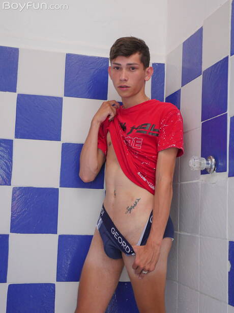 Pretty boy Billy Garcia undressing and showing his butt in shower