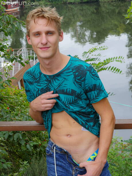 Young Oliver Morgenson posing naked and showing hot butt outdoor