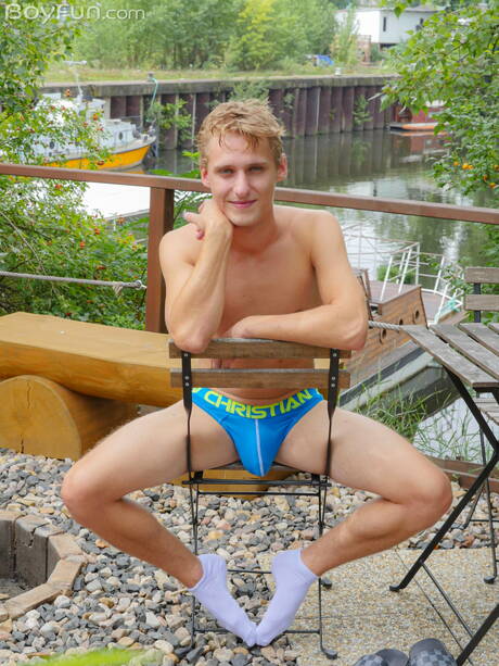 Young Oliver Morgenson posing naked and showing hot butt outdoor