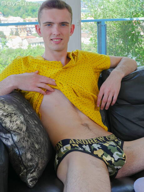 Young boy Adam Barnes get naked and showing his butt