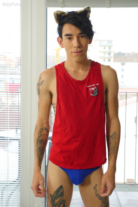 Latino twink Roman Capellini posing nude and showing hot butt in the kitchen