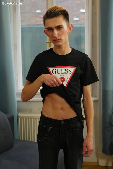 Young dude Andy Ford undressing and showing nice ass