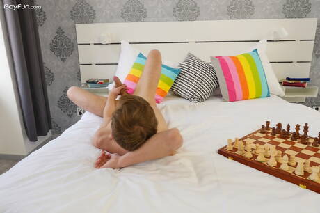 Hot twink Ron Negba undressing and showing his butt