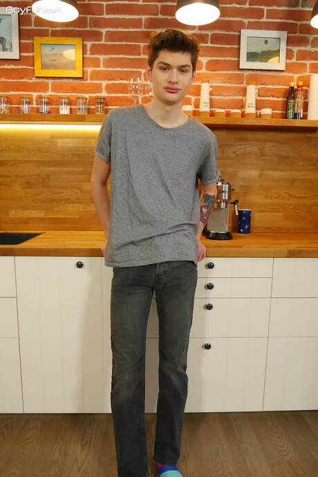 Young dude Curtis Cameron posing nude in kitchen