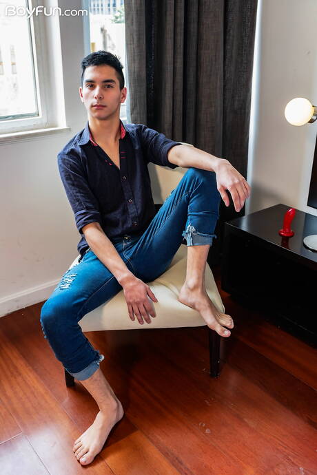 Latin young dude Francis Gerard play with toy