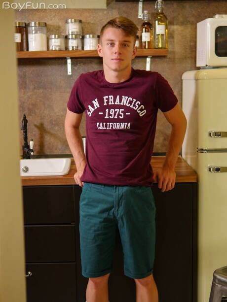 Czech young boy Mark Troy undressing and showing nice ass in the kitchen