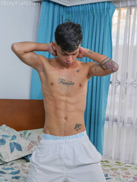 Latino beautiful boy Slim Rich posing nude and showing his butt