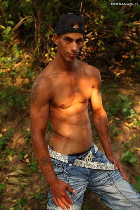 Latino hunky guy Gypsy Peter shows a perfect body outdoor