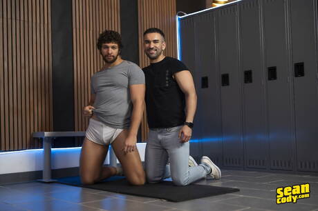 Attractive guy Drew Ryan and gorgeous dude Shamu Azizam in hard anal sex in bathroom