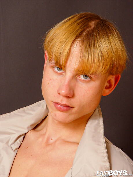 Young boy Julian playing with cock