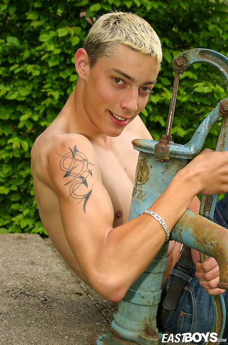 Pretty boy Volodej teasing his cock outdoor