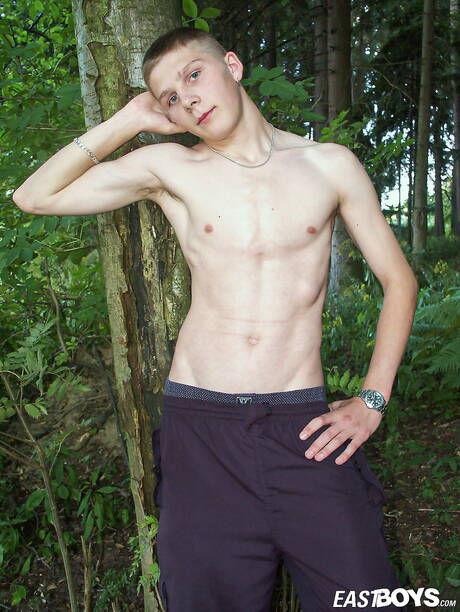 Young dude Milovan undressing and showing tight ass outdoor