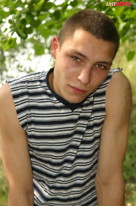 Young boy Keny get naked and showing tight butt outside