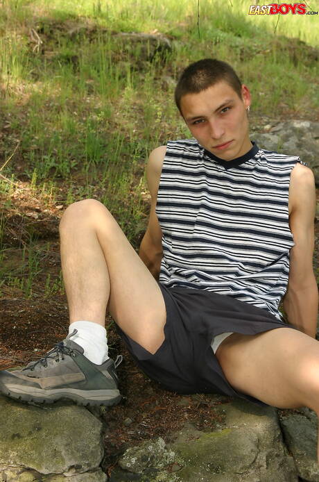 Young boy Keny get naked and showing tight butt outside