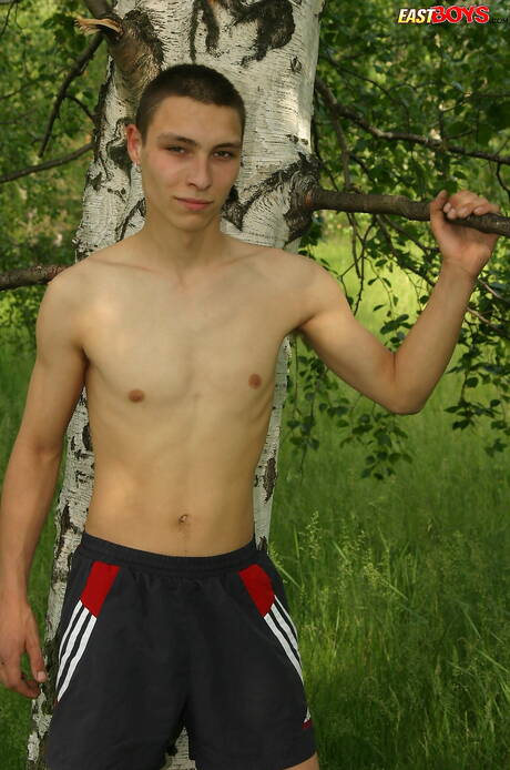 Young boy Keny get naked and showing tight butt outside