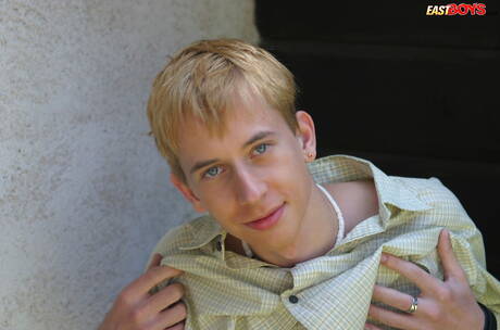 Young boy Kelly shows a beautiful body outdoor