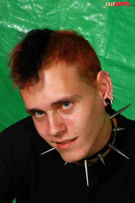 Young dude Ulick undressing and showing tight ass