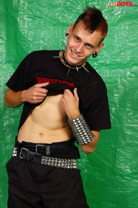 Young dude Ulick undressing and showing tight ass