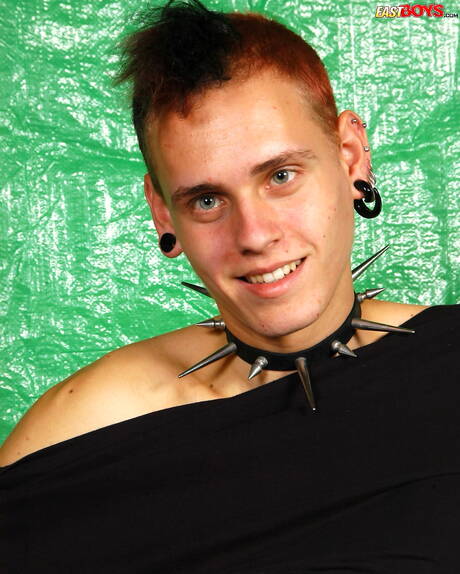 Young dude Ulick undressing and showing tight ass