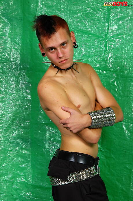 Young dude Ulick undressing and showing tight ass