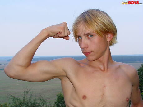 Young boy Julian posing naked and showing tight ass outdoor