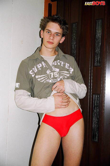 Hot twink Robbie posing nude and showing hot butt in bathroom