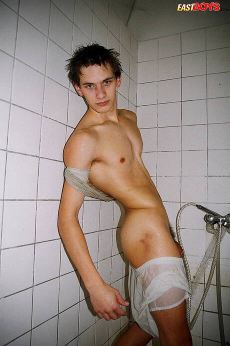 Twink Robbie undressing and showing nice ass in shower