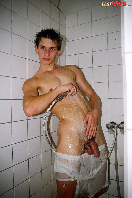Twink Robbie undressing and showing nice ass in shower