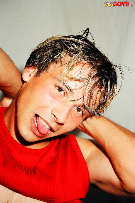 Beefcake Petros undressing