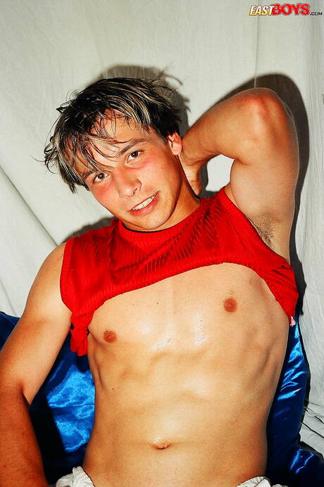 Beefcake Petros undressing