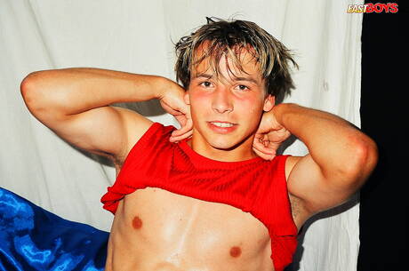 Beefcake Petros undressing