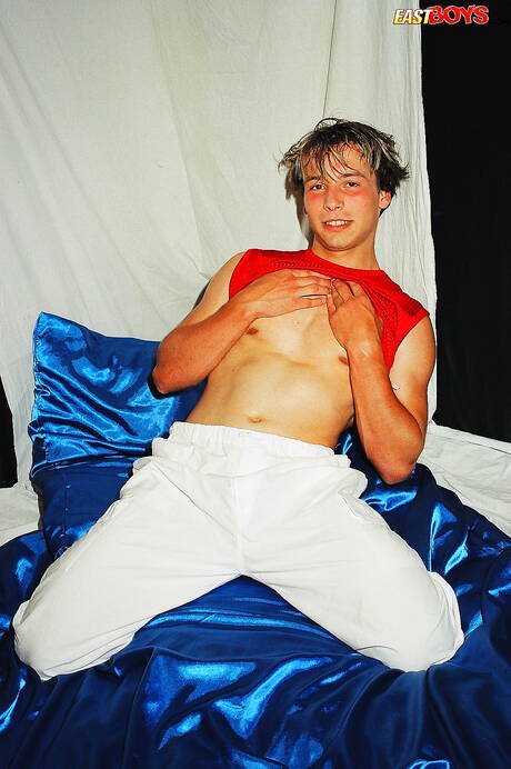 Beefcake Petros undressing