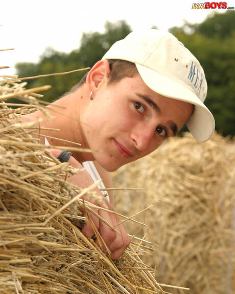 Beautiful boy Jimmy shows a beautiful body outdoor