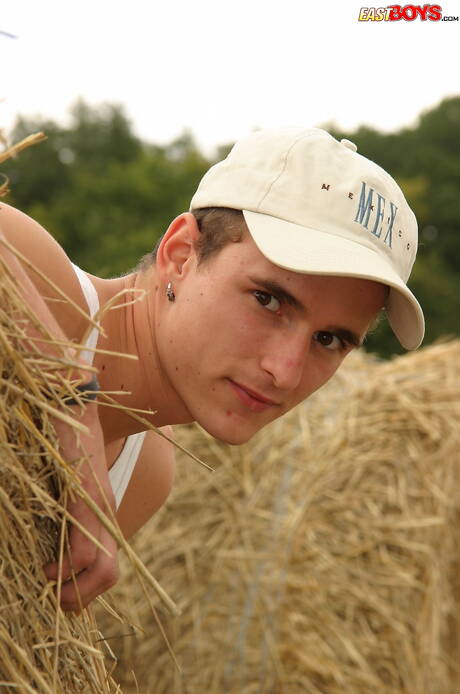 Beautiful boy Jimmy shows a beautiful body outdoor