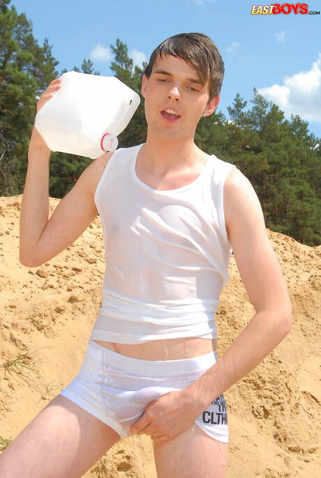 Beautiful boy Emil shows a perfect body outside