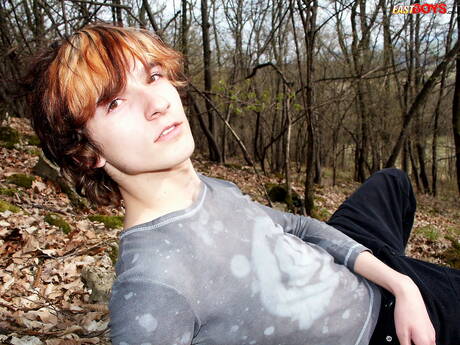 Young boy Samek playing with cock outdoor