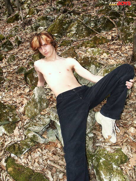 Young boy Samek playing with cock outdoor