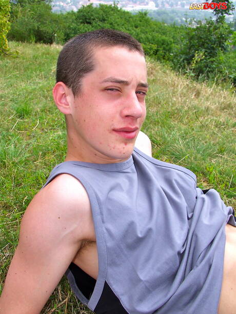 Beautiful boy Erik playing with cock outdoor