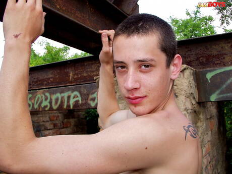 Beautiful boy Erik playing with cock outdoor