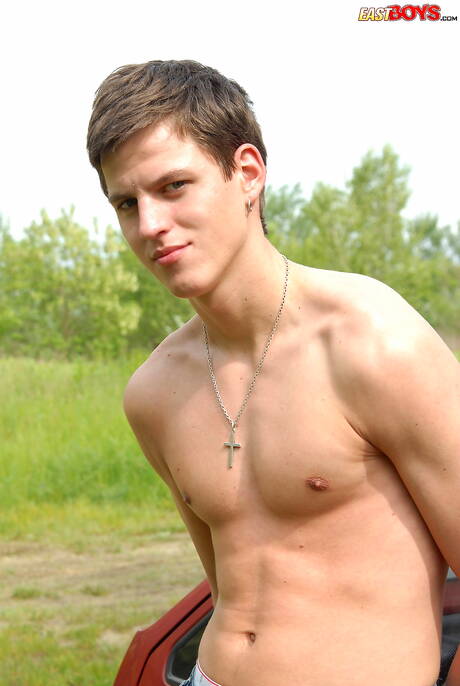 Young Cooper posing naked outside