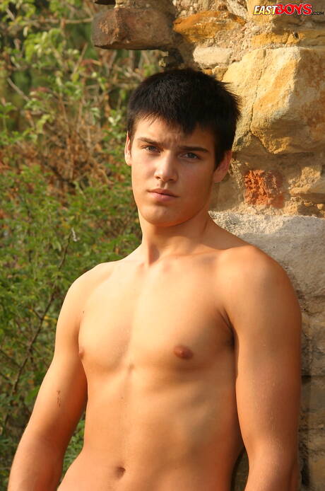 Beautiful boy Ikar playing with dick outside