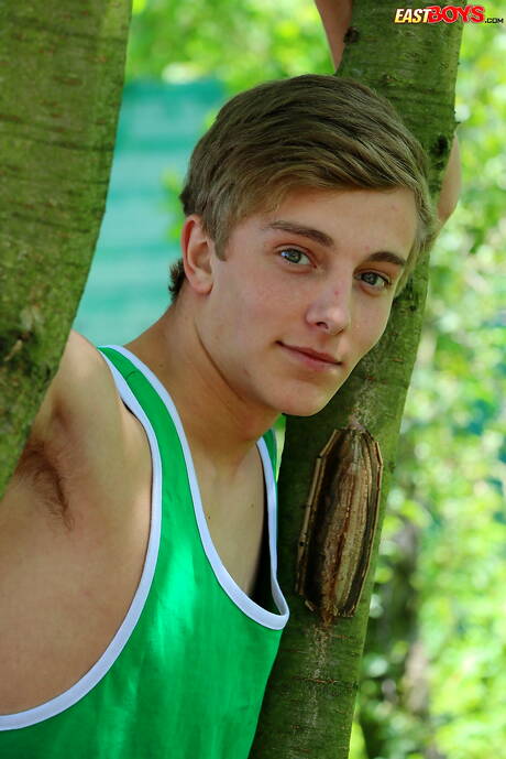 Hot twink Abel Romanov posing naked outside