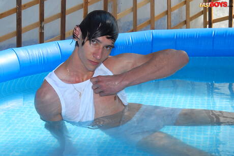 Young Dominic get naked and showing tight butt in the pool
