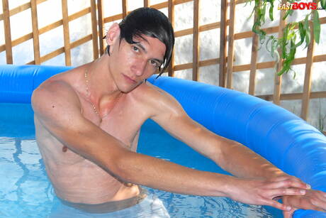Young Dominic get naked and showing tight butt in the pool