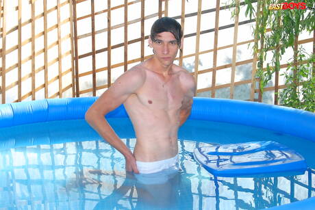 Young Dominic get naked and showing tight butt in the pool